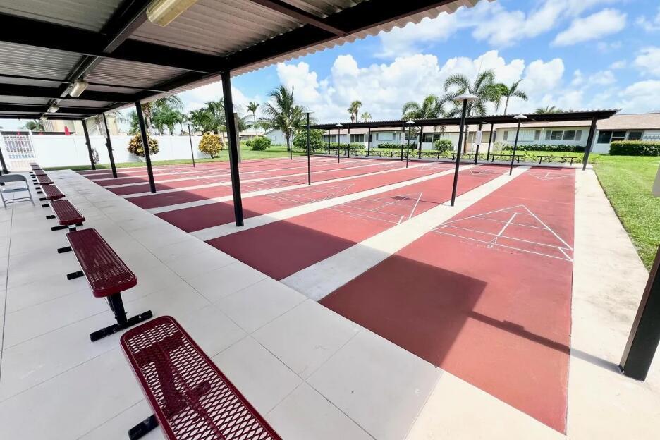 2894 East Crosley Drive, Unit J West Palm Beach, FL 33415 - Photo 11 of 11 a view of a balcony with yard