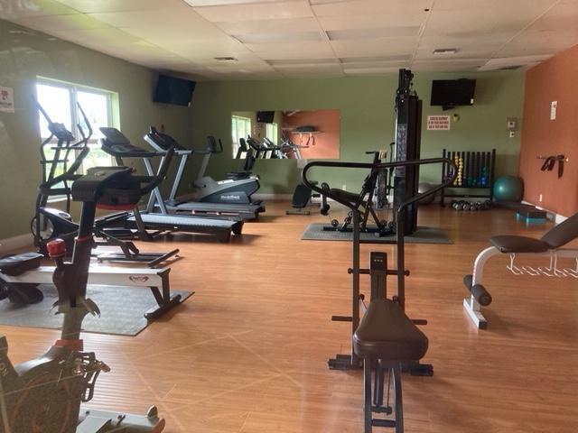 2894 East Crosley Drive, Unit J West Palm Beach, FL 33415 - Photo 6 of 11 a view of a room with gym equipment