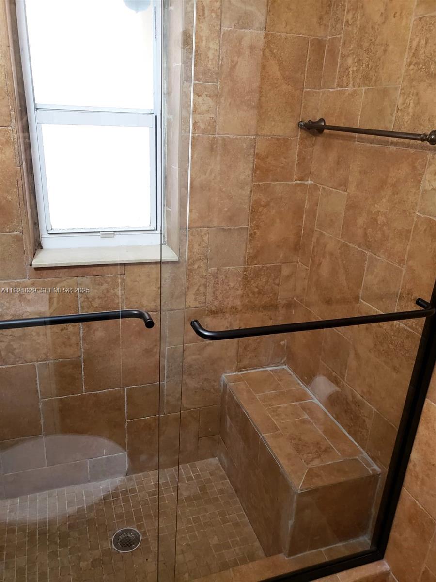 635 Southwest 64th Court Miami, FL 33144 - Photo 24 of 33 a bathroom with a shower