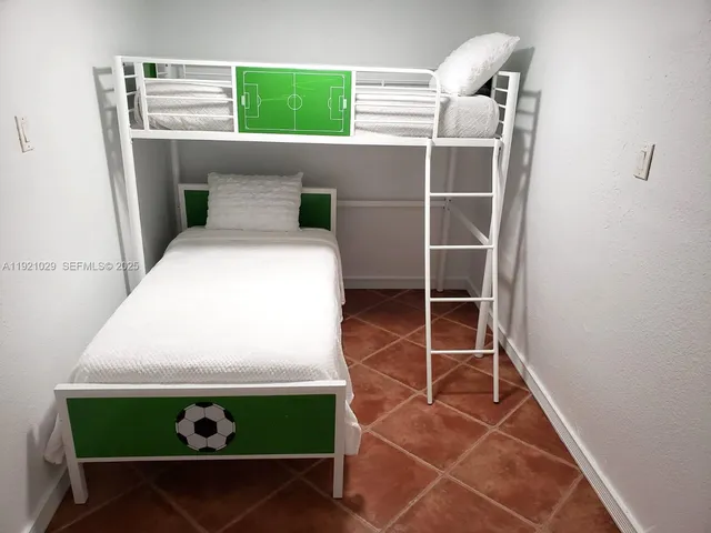 a view of a garden with potted plants