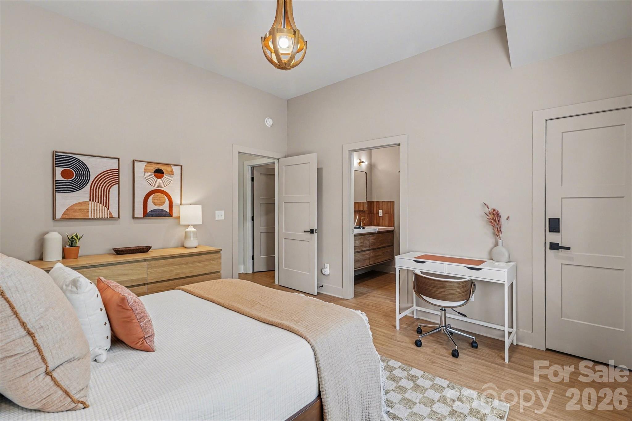 12141 Coyle Road, Unit 12 Stanfield, NC 28163 - Photo 21 of 28 a bedroom with a bed and a chair in it