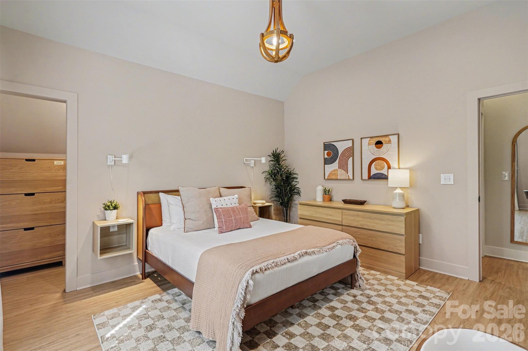 12141 Coyle Road, Unit 12 Stanfield, NC 28163 - Photo 22 of 28 a bedroom with a bed and a cabinets