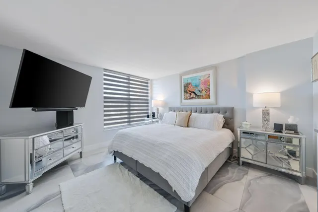 a bathroom with a sink double vanity and a shower