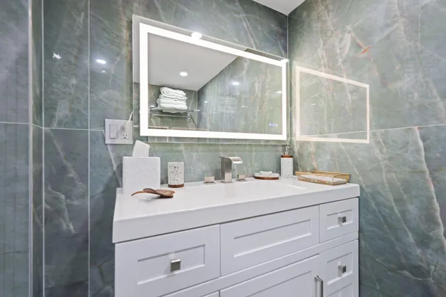 a bathroom with a shower and a toilet