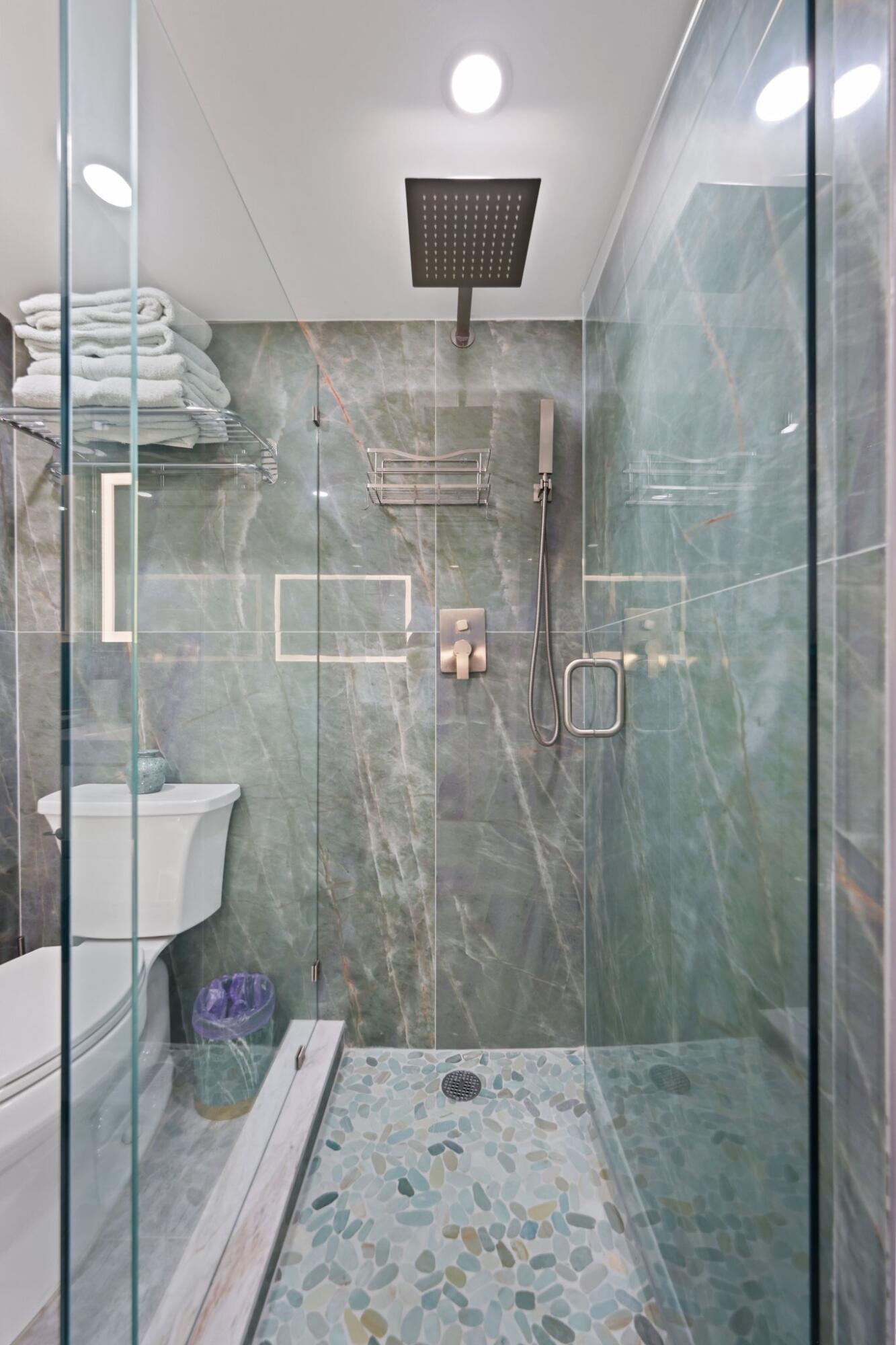 12 Royal Palm Way, Unit 605 Boca Raton, FL 33432 - Photo 34 of 47 a bathroom with a shower