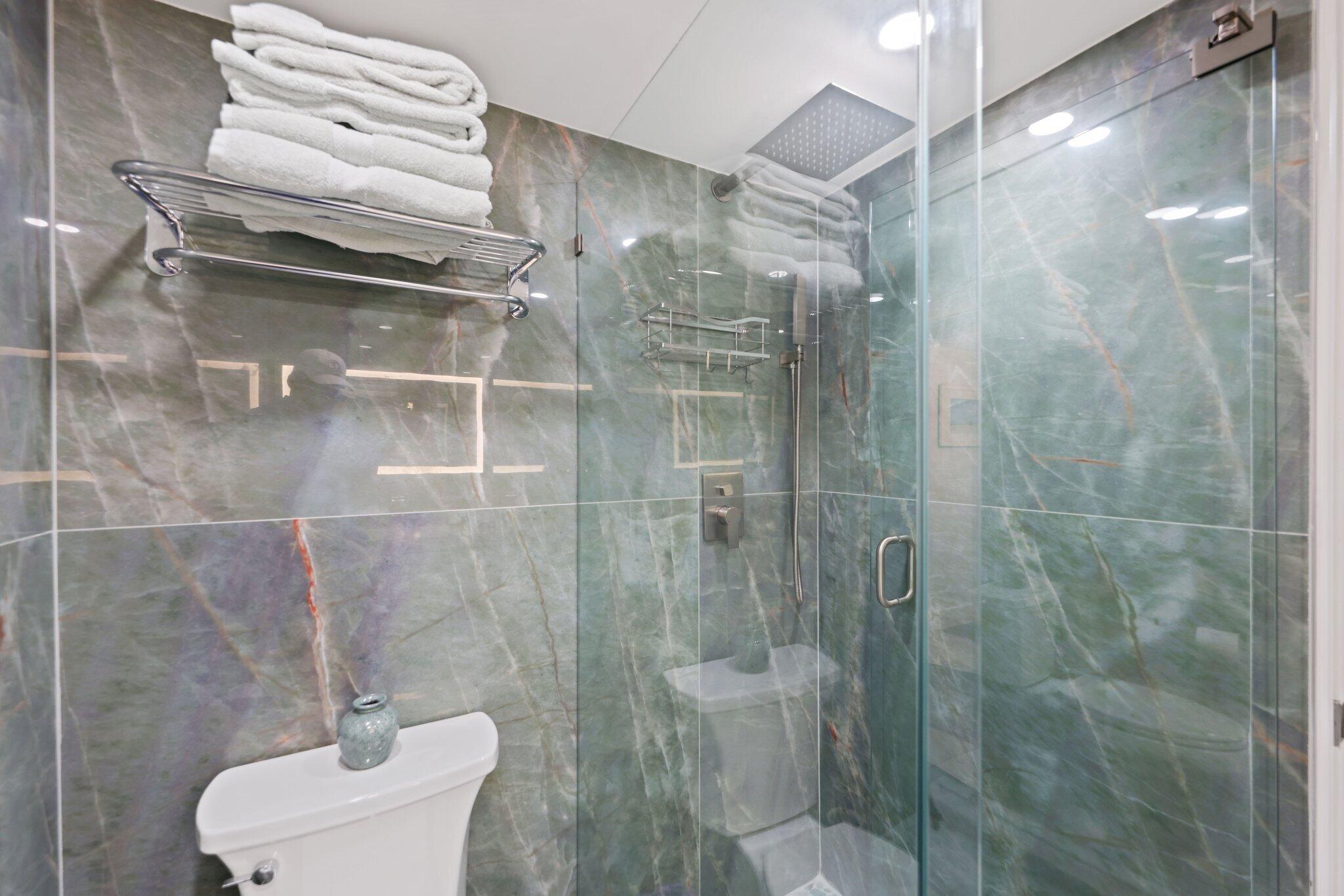 12 Royal Palm Way, Unit 605 Boca Raton, FL 33432 - Photo 35 of 47 a bathroom with a shower and a toilet