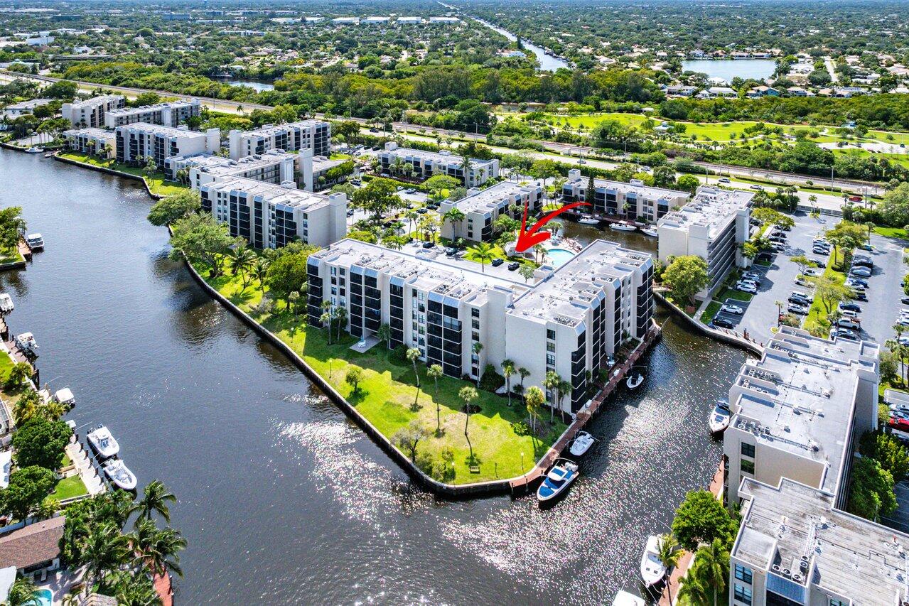 12 Royal Palm Way, Unit 605 Boca Raton, FL 33432 - Photo 39 of 47 an aerial view of a house with swimming pool outdoor seating and yard