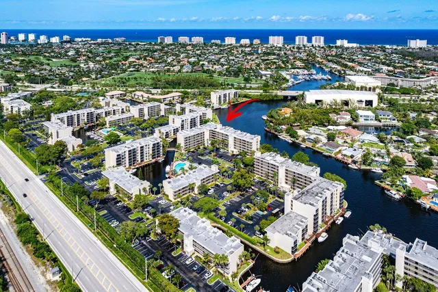 a view of a lake with a building in the background