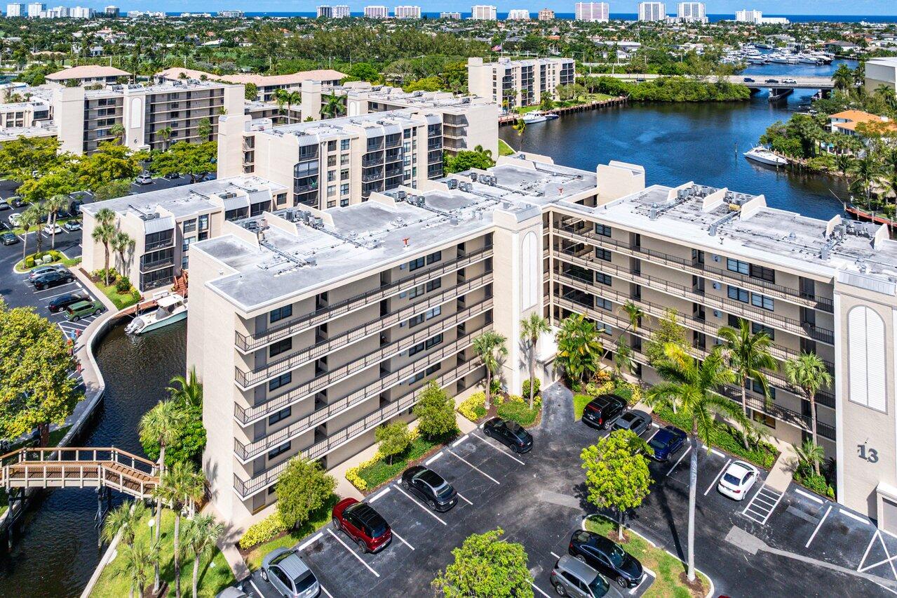 12 Royal Palm Way, Unit 605 Boca Raton, FL 33432 - Photo 44 of 47 a view of a lake with a building in the background