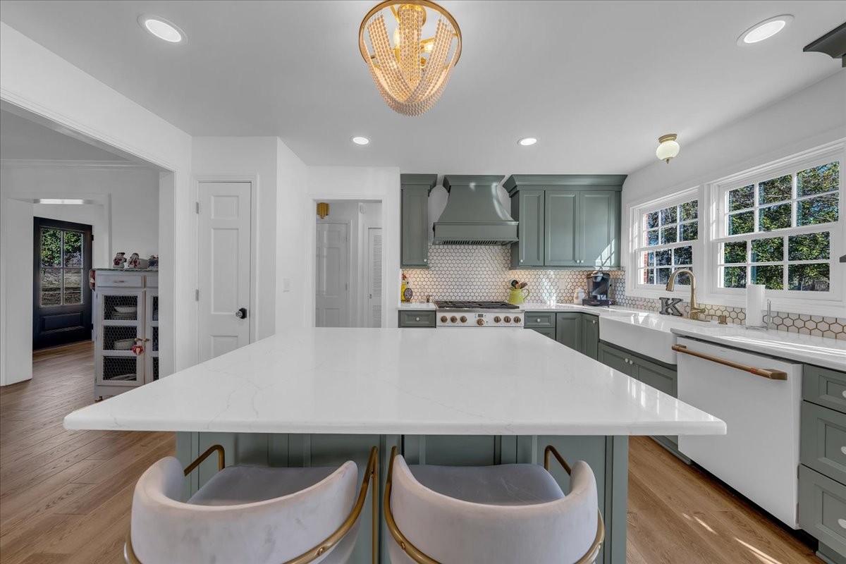 251 Miller Road Hillsboro, TN 37342 - Photo 28 of 80 a kitchen with a table chairs sink and cabinets