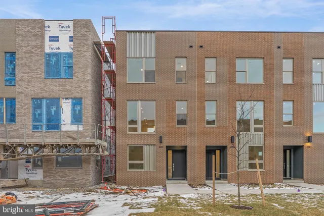 a front view of a building with street