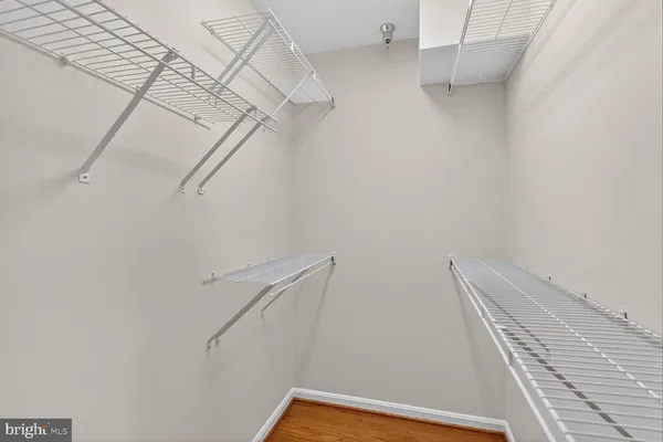 a view of a room with racks on the wall