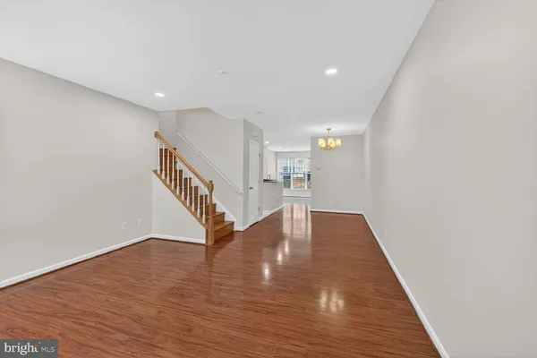 a view of entryway with wooden floor