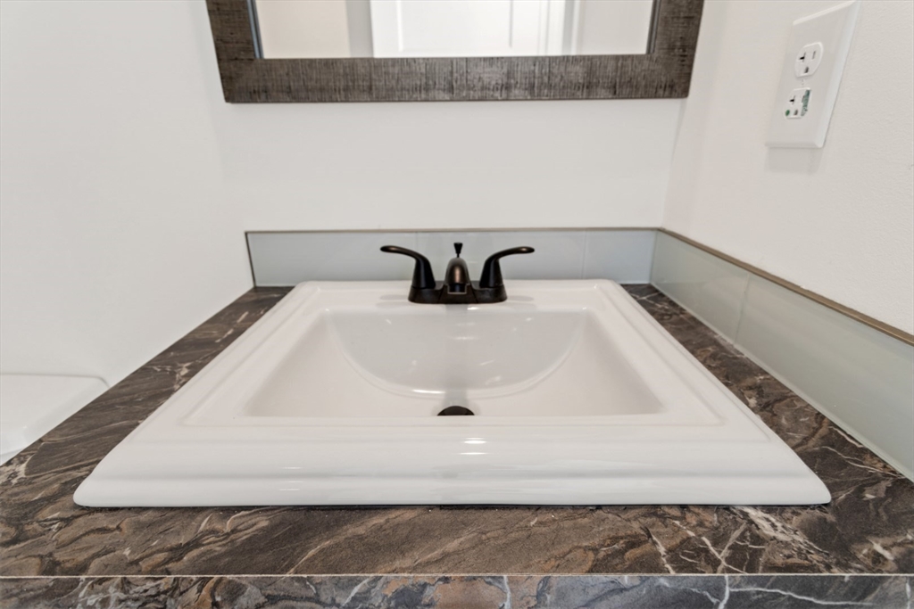 98 Newbury Street, Unit 4B Danvers, MA 01923 - Photo 26 of 32 a close view of sink
