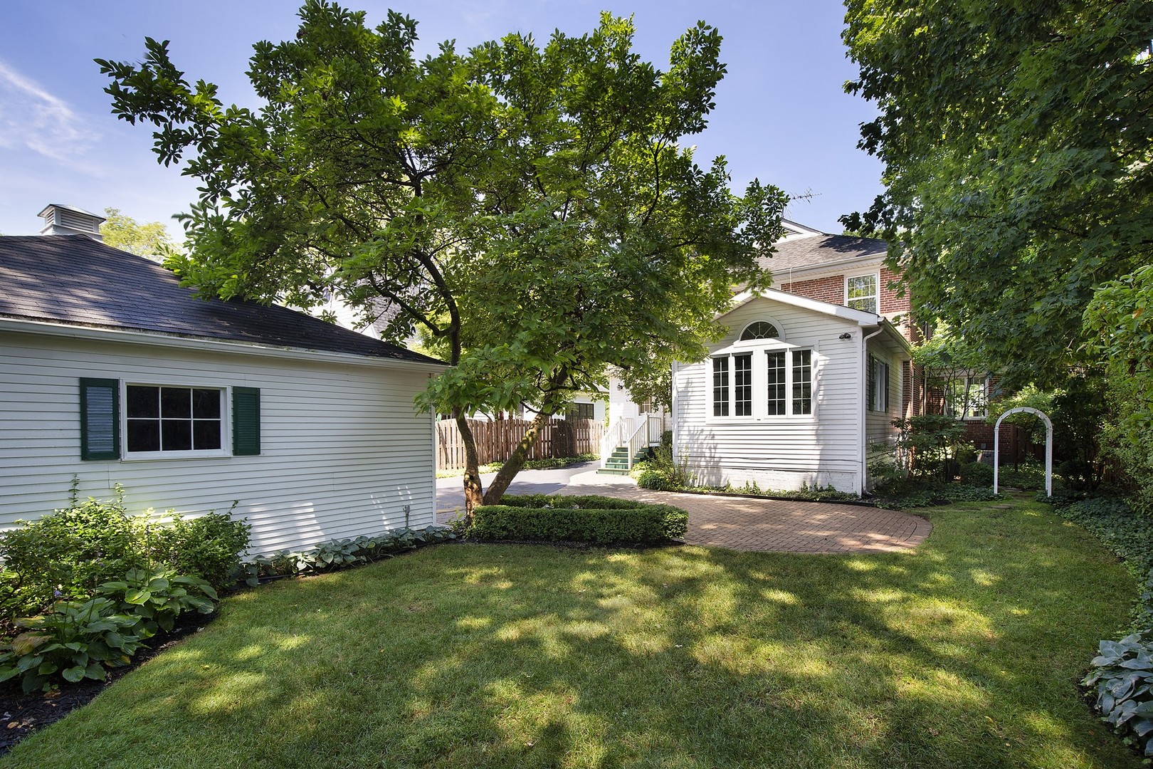 206 Sheridan Road Winnetka, IL 60093 - Photo 16 of 20 a front view of house with yard and trees