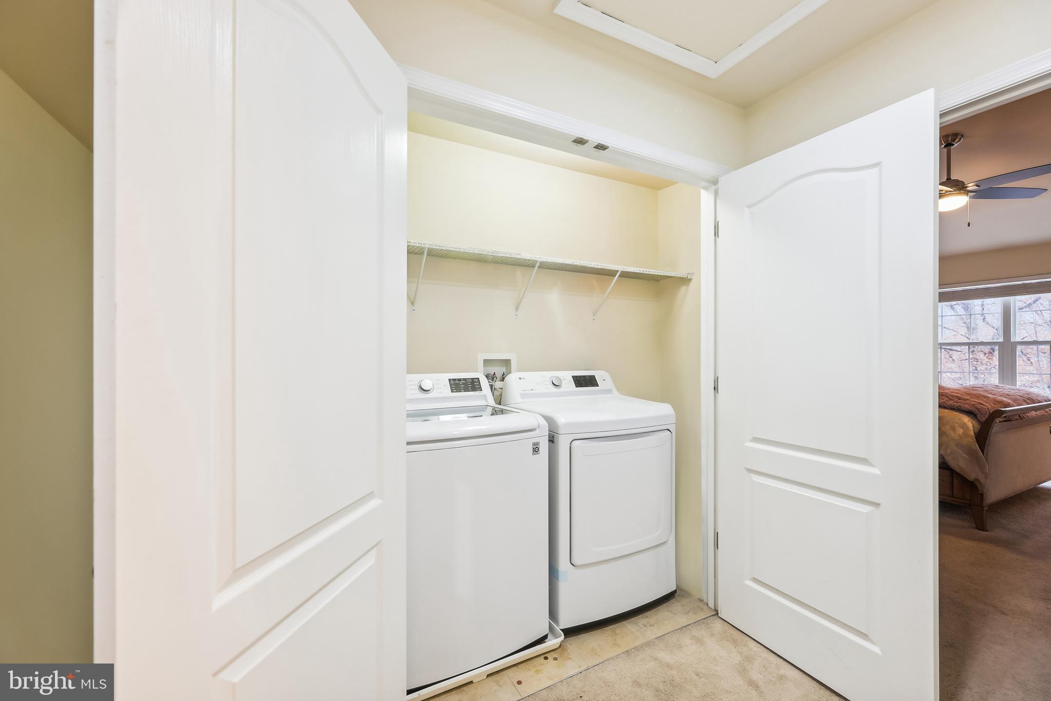 15707 Monksilver Bend Upper Marlboro, MD 20774 - Photo 33 of 58 Laundry closet w/full-sized W&D + shelving