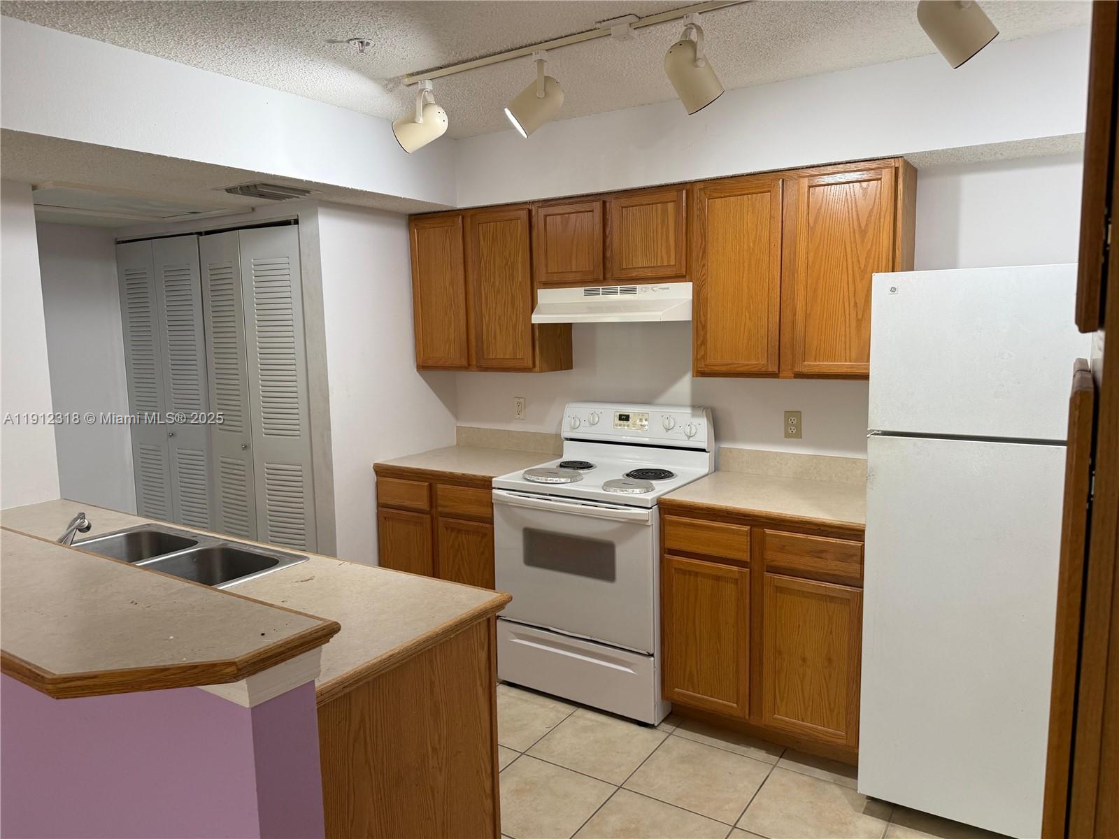 9907 Westwood Drive, Unit 212 Tamarac, FL 33321 - Photo 4 of 13