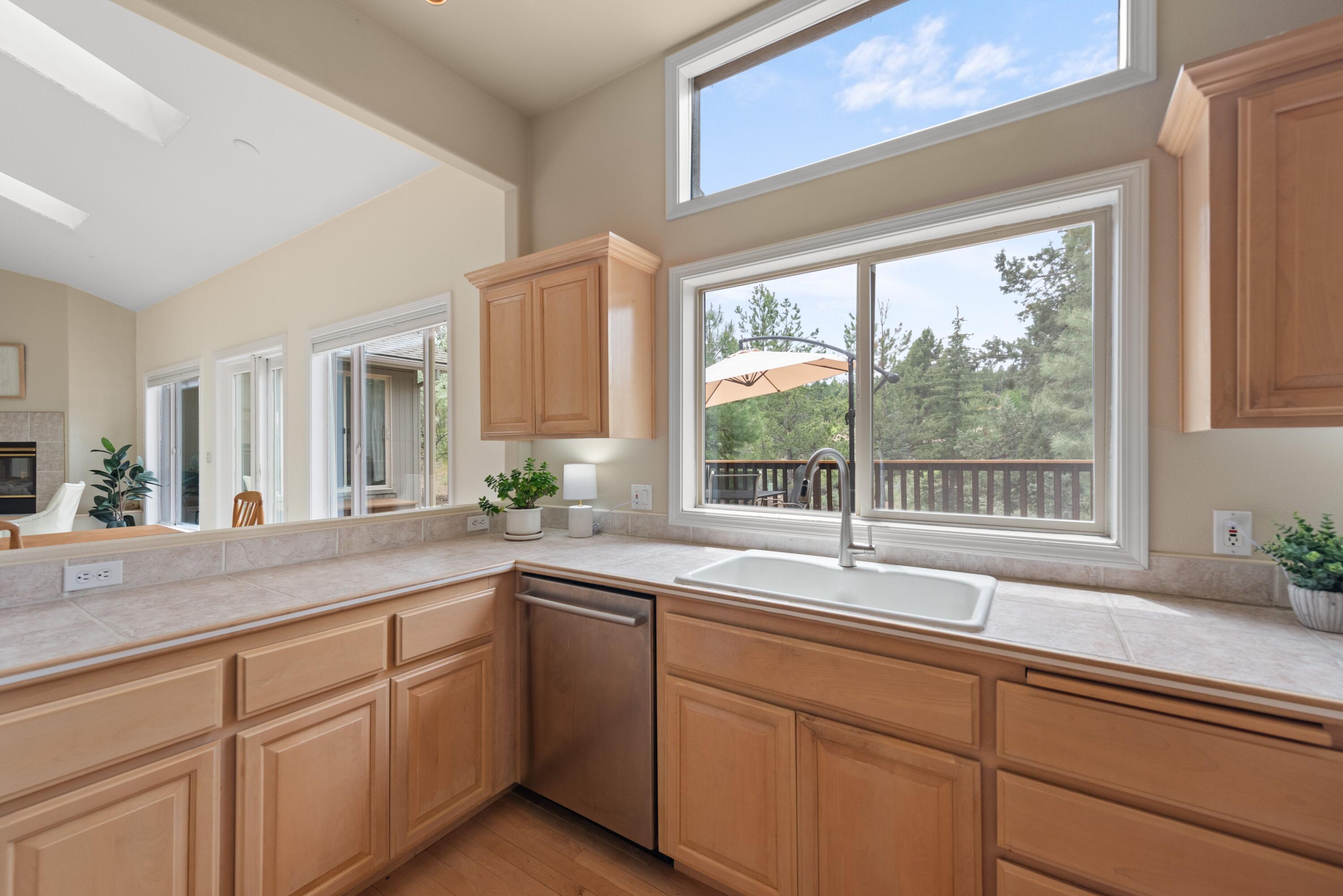 2255 Northwest Putnam Road Bend, OR 97703 - Photo 17 of 49 Beautiful view from the kitchen sink looking out to back of the home.