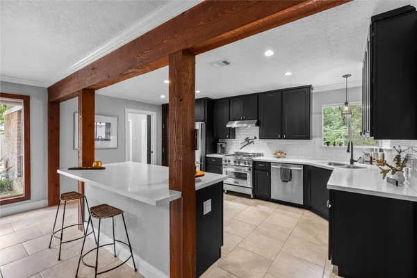 a bathroom with a double vanity sink mirror and double