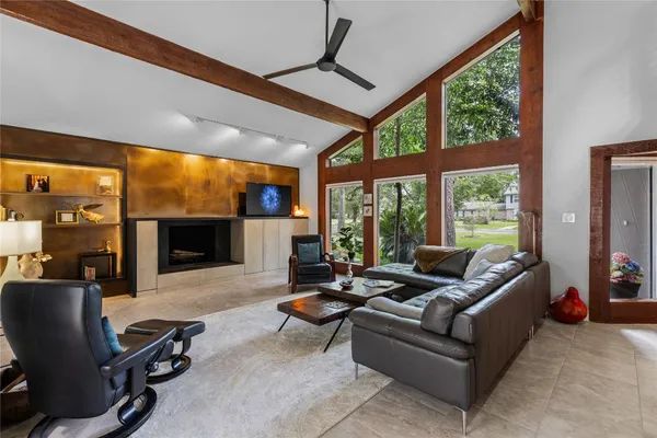 a kitchen with stainless steel appliances granite countertop a stove a refrigerator and a sink