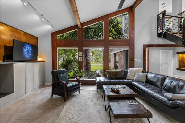 a kitchen with stainless steel appliances granite countertop a refrigerator stove a sink and dishwasher