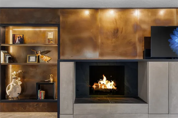 a kitchen with stainless steel appliances granite countertop a stove a sink a oven and a refrigerator