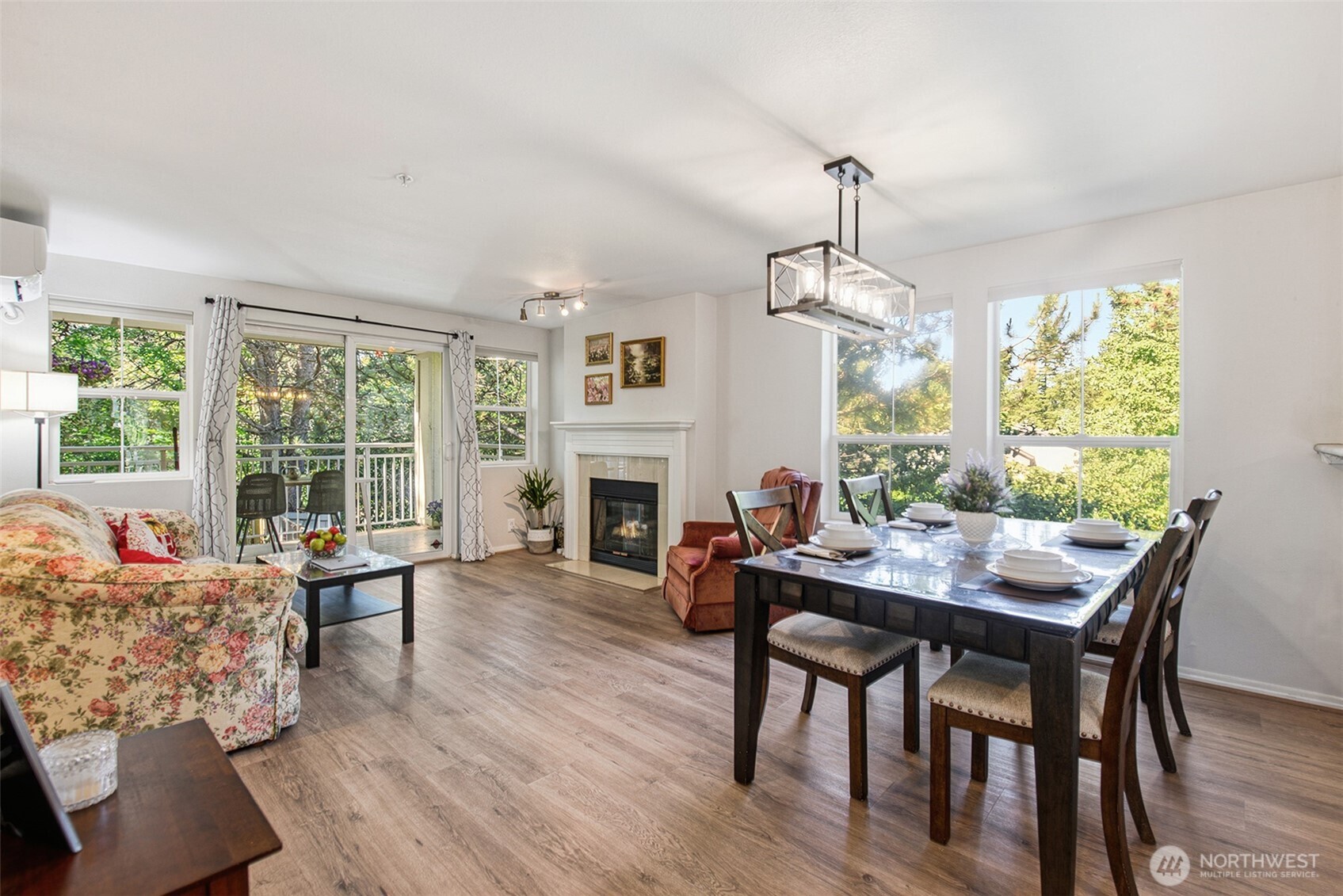4423 249th Terrace Southeast Issaquah, WA 98029 - Photo 5 of 27 a dining room with furniture window wooden floor