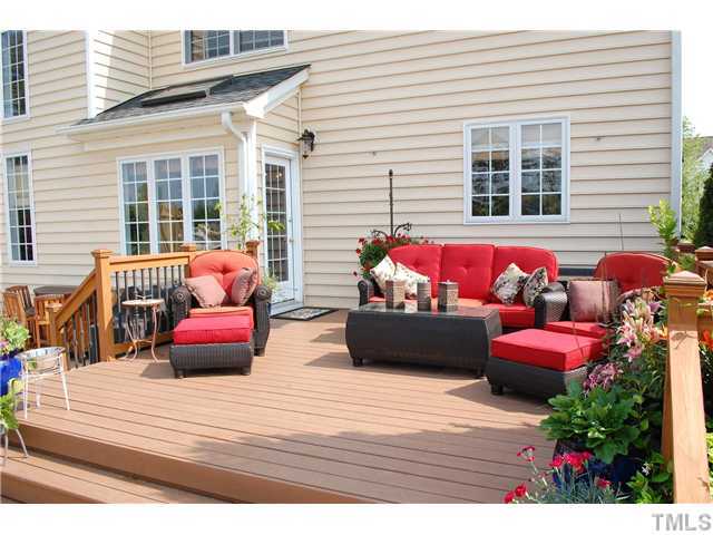 9140 Meadow Mist Court Raleigh, NC 27617 - Photo 23 of 25 Large deck is great for entertaining and enjoying the outdoors!