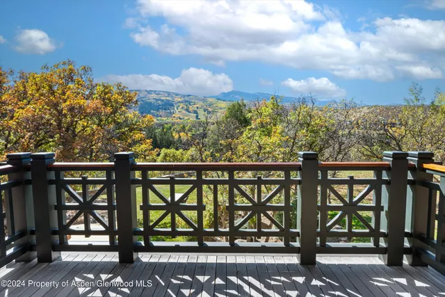 a view of a street from a balcony