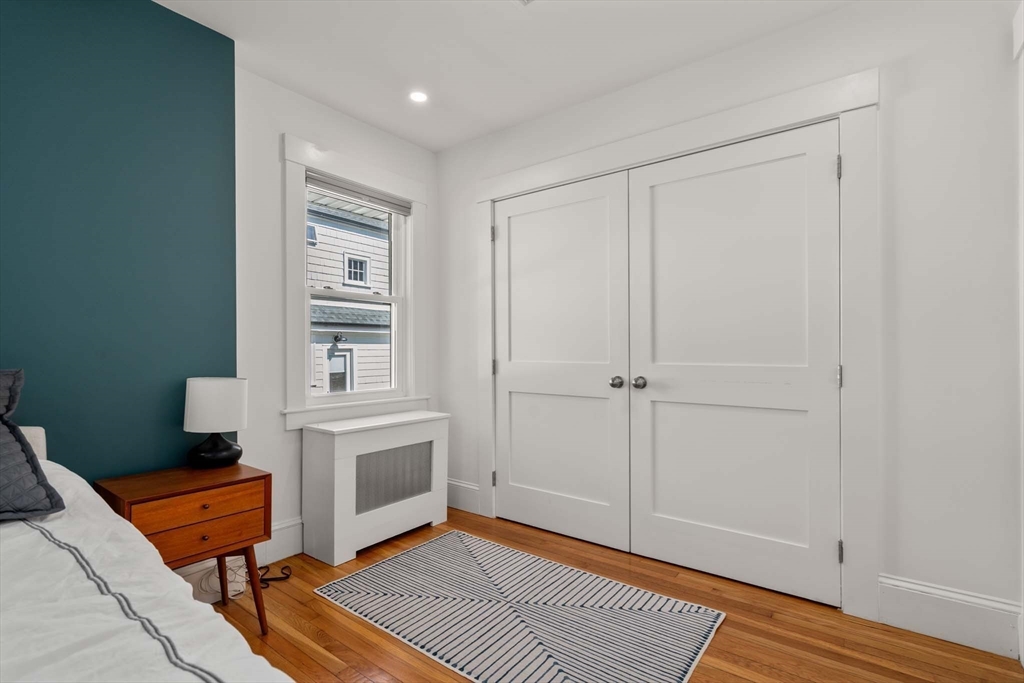 69 Henderson Street Needham, MA 02492 - Photo 14 of 26 a view of a livingroom with a fireplace