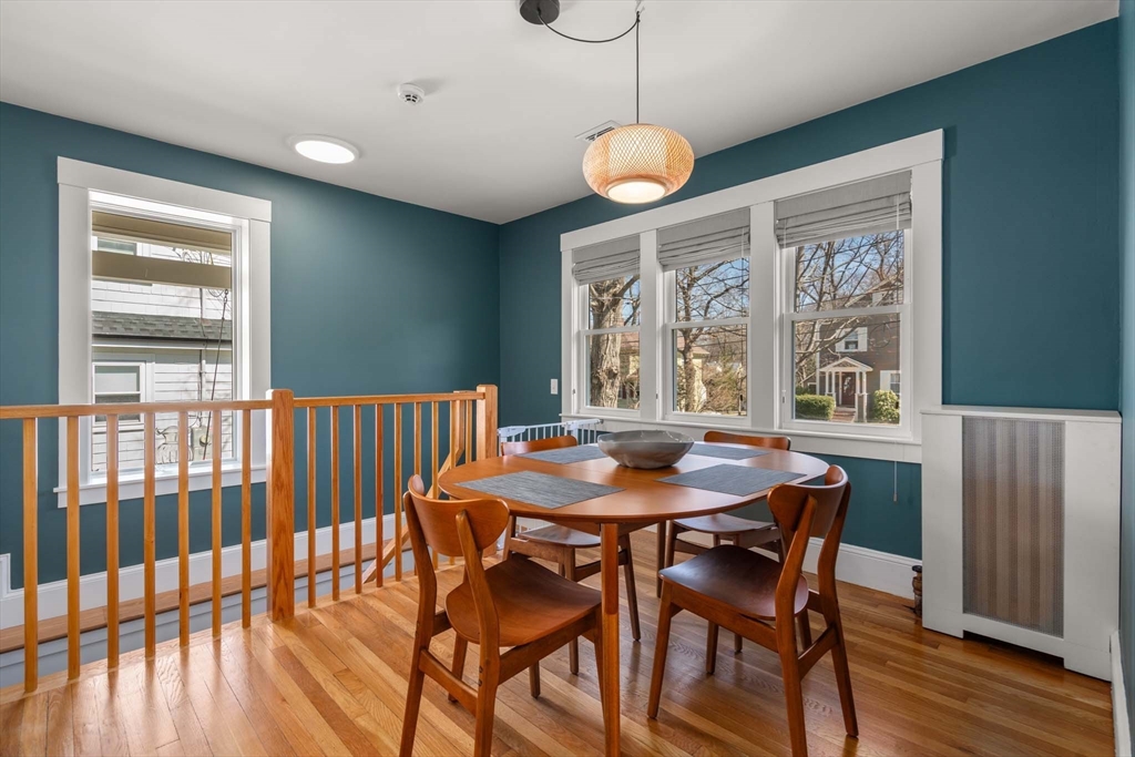 69 Henderson Street Needham, MA 02492 - Photo 10 of 26 a view of a dining room with furniture window and wooden floor