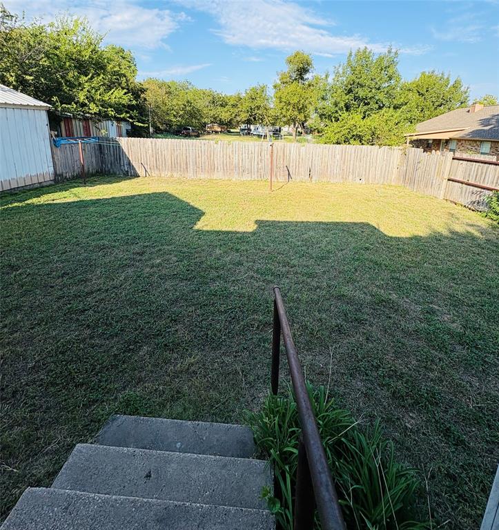 407 North Lane Street Decatur, TX 76234 - Photo 19 of 22 View of fenced backyard