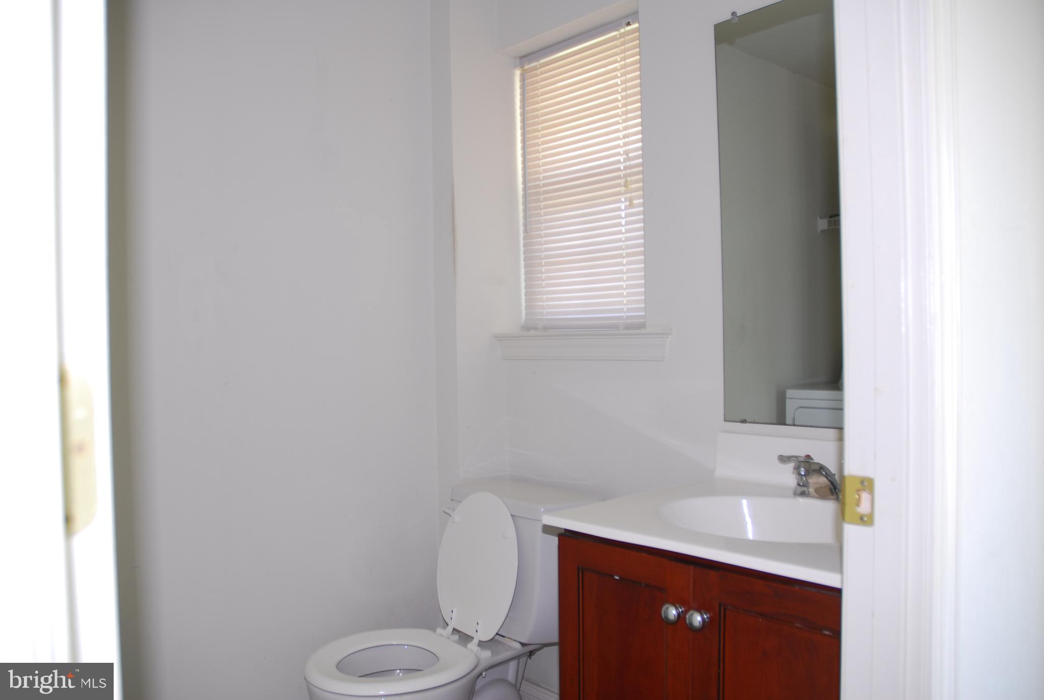 1611 Whitehall Road Norristown, PA 19403 - Photo 11 of 15 Powder Room with laundry