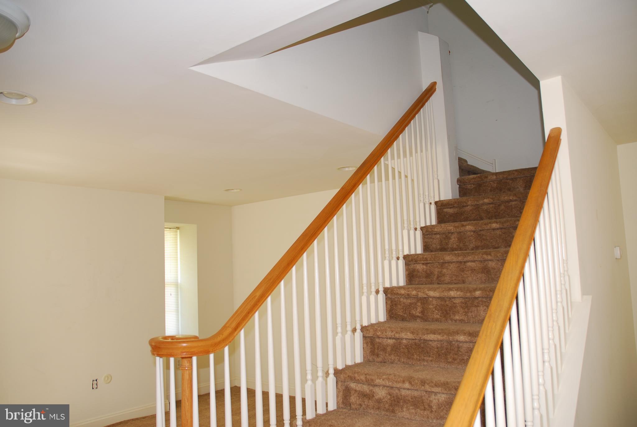 1611 Whitehall Road Norristown, PA 19403 - Photo 9 of 15 Living room and staircase
