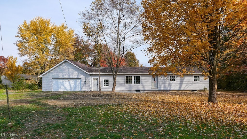 5552 Nelson Mosier Road Southington, OH 44470 - Photo 1 of 24 View of front facade featuring a garage