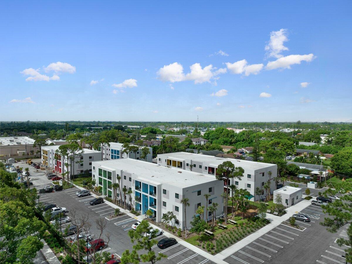 4250 Lakewood Road, Unit 101 Palm Springs, FL 33461 - Photo 18 of 20 a view of a city with lots of green space