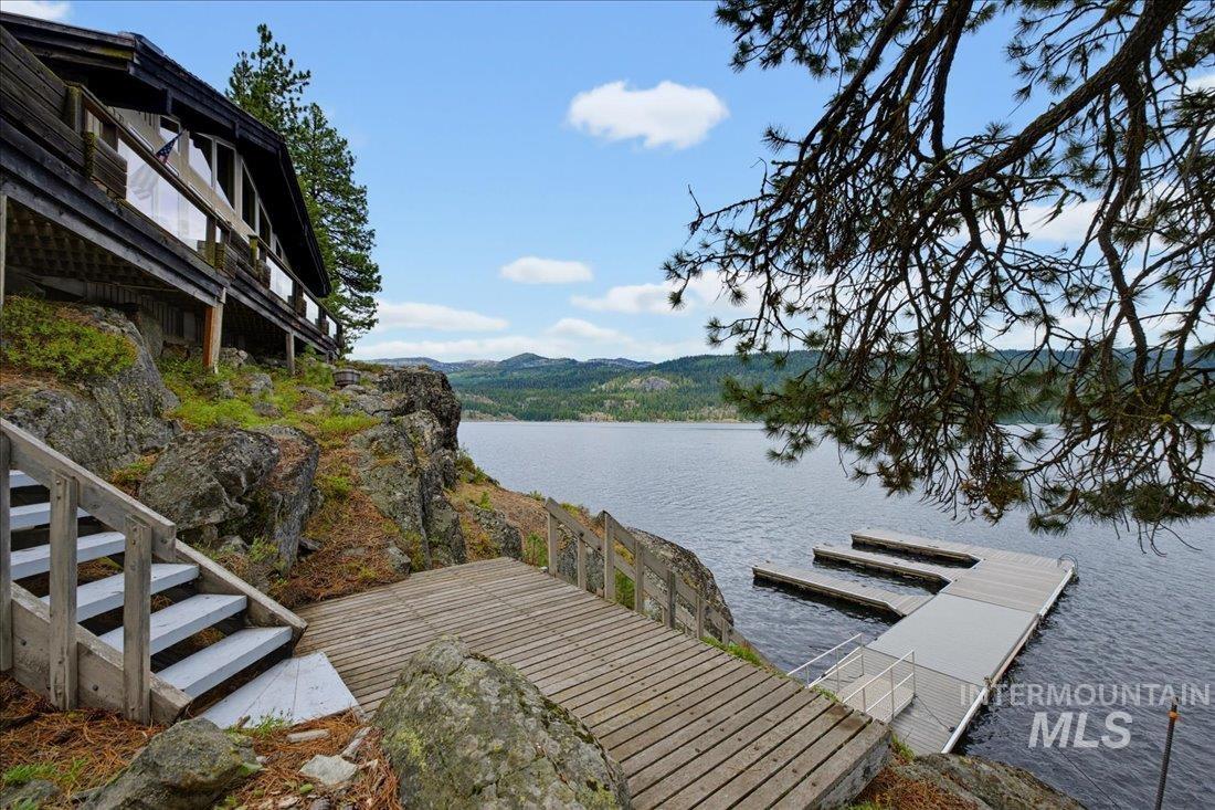 3800 Warren Wagon Road McCall, ID 83638 - Photo 36 of 50 Waterfront property featuring a private floating dock with multiple slips, a multi-level wooden deck, and exterior stairs