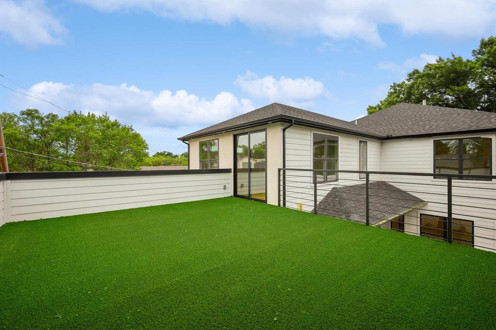 3902 Park Lane Dallas, TX 75220 - Photo 23 of 36 a view of a house with a yard and a garden