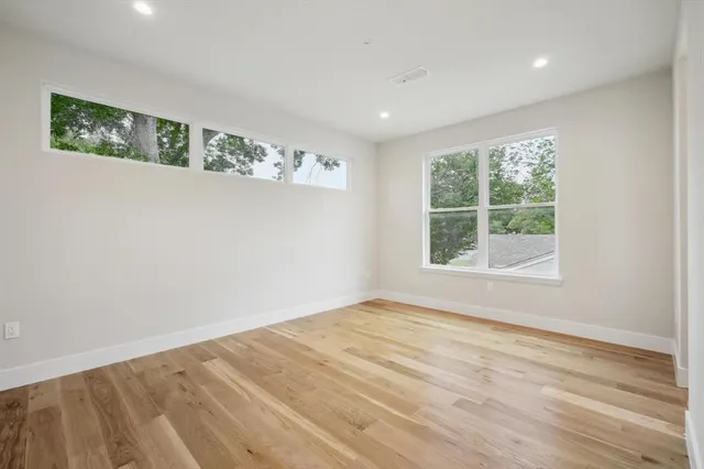 a view of two chairs in a balcony
