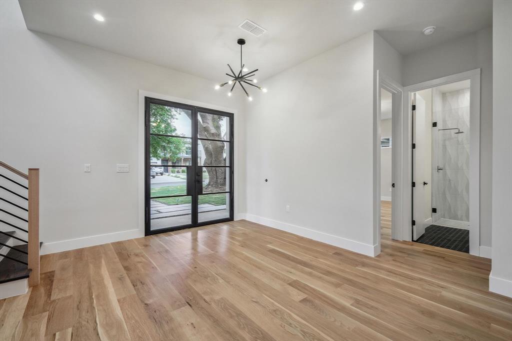 3902 Park Lane Dallas, TX 75220 - Photo 35 of 36 wooden floor in an empty room with a window