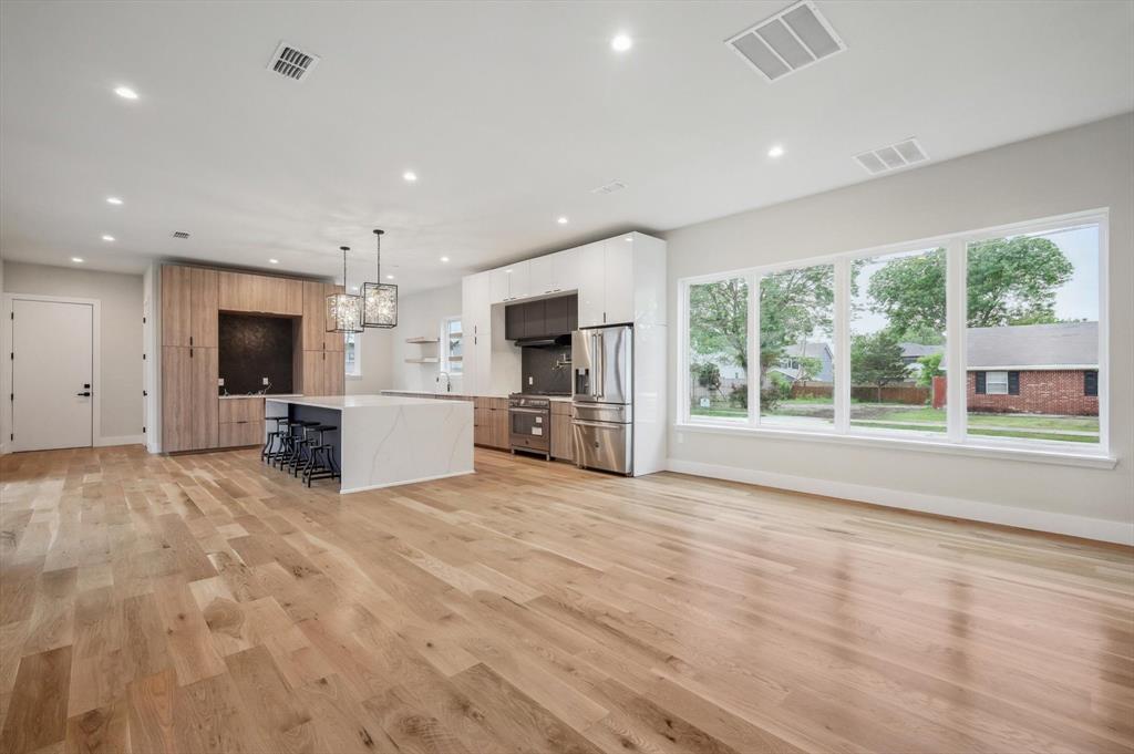 3902 Park Lane Dallas, TX 75220 - Photo 4 of 36 a view of a kitchen with microwave and cabinets