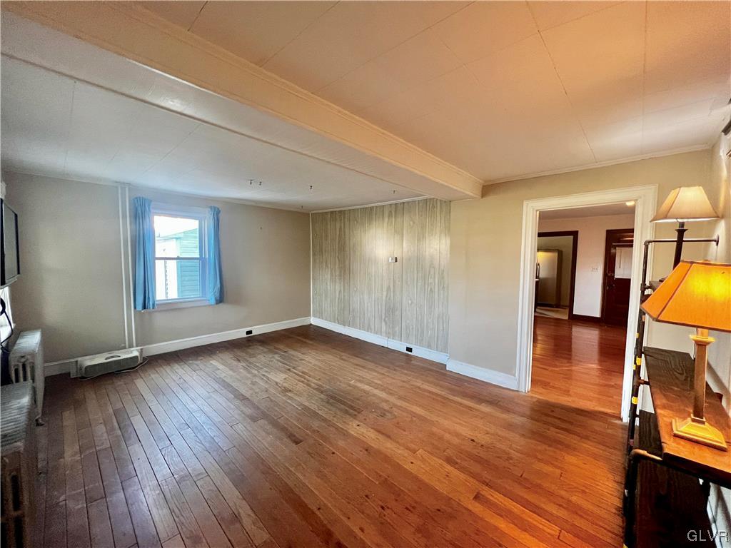 705 Main Street Stockertown, PA 18083 - Photo 5 of 23 a view of a big room with wooden floor and windows