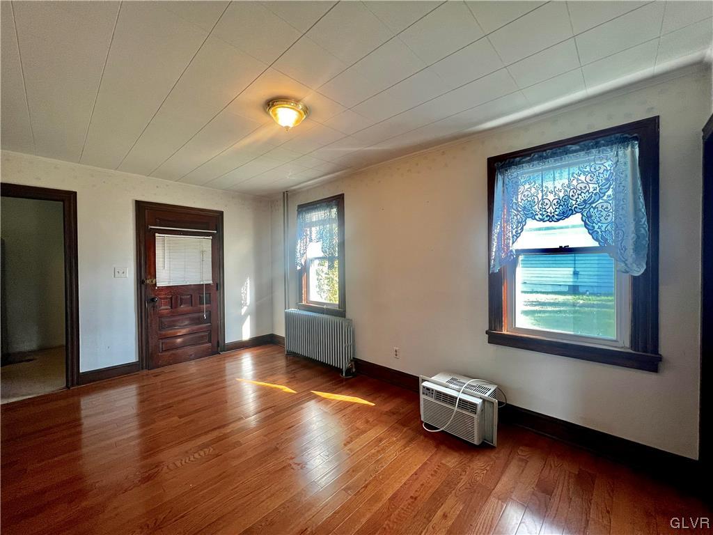 705 Main Street Stockertown, PA 18083 - Photo 6 of 23 a room with window and wooden floor