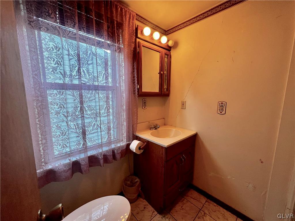 705 Main Street Stockertown, PA 18083 - Photo 10 of 23 a bathroom with a sink toilet and shower