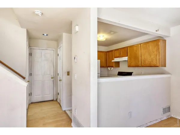 a view of a hallway with painted walls