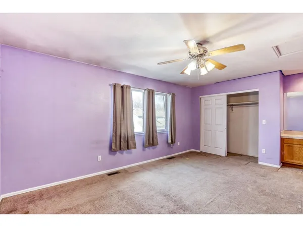 a view of an empty room with window