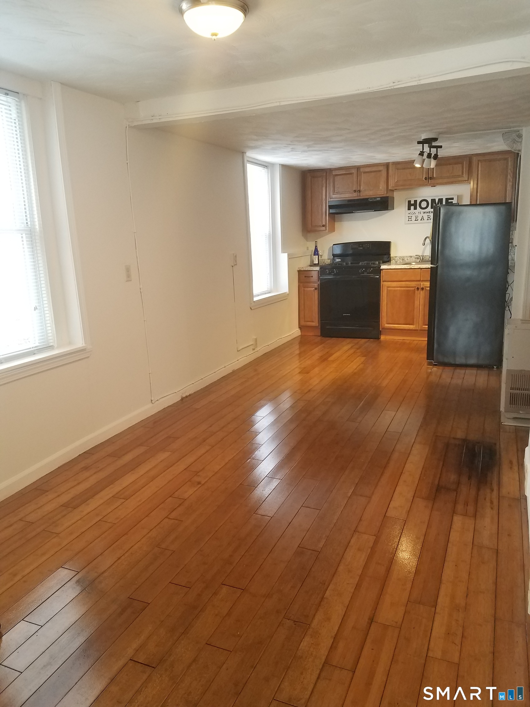 168 Brick Top Road, Unit 1 Windham, CT 06280 - Photo 4 of 7 Open Living/Dining Area