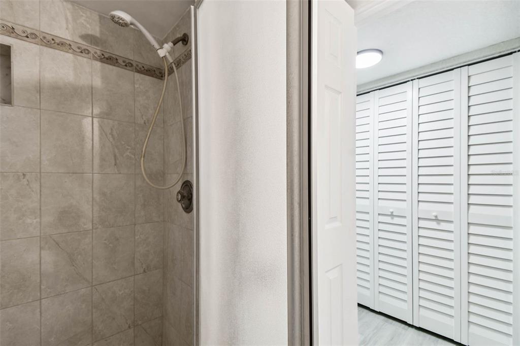 4726 Marine Parkway, Unit 103 New Port Richey, FL 34652 - Photo 31 of 81 a bathroom with a shower