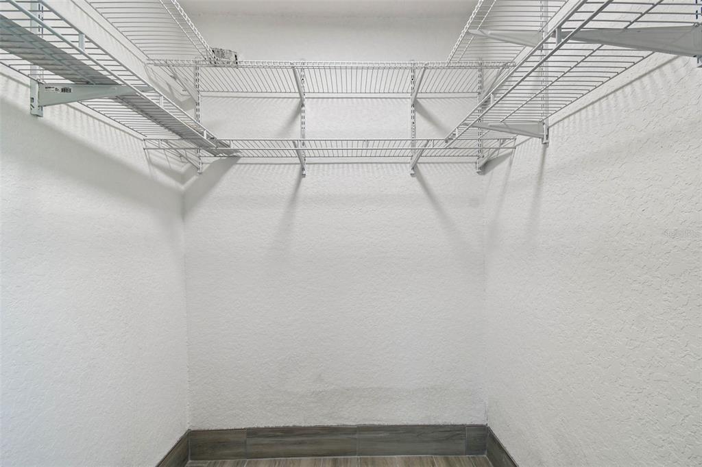 4726 Marine Parkway, Unit 103 New Port Richey, FL 34652 - Photo 36 of 81 a view of a room with racks on the wall