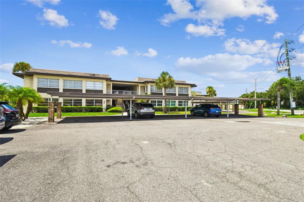 4726 Marine Parkway, Unit 103 New Port Richey, FL 34652 - Photo 42 of 81 a view of a street with a building in the background